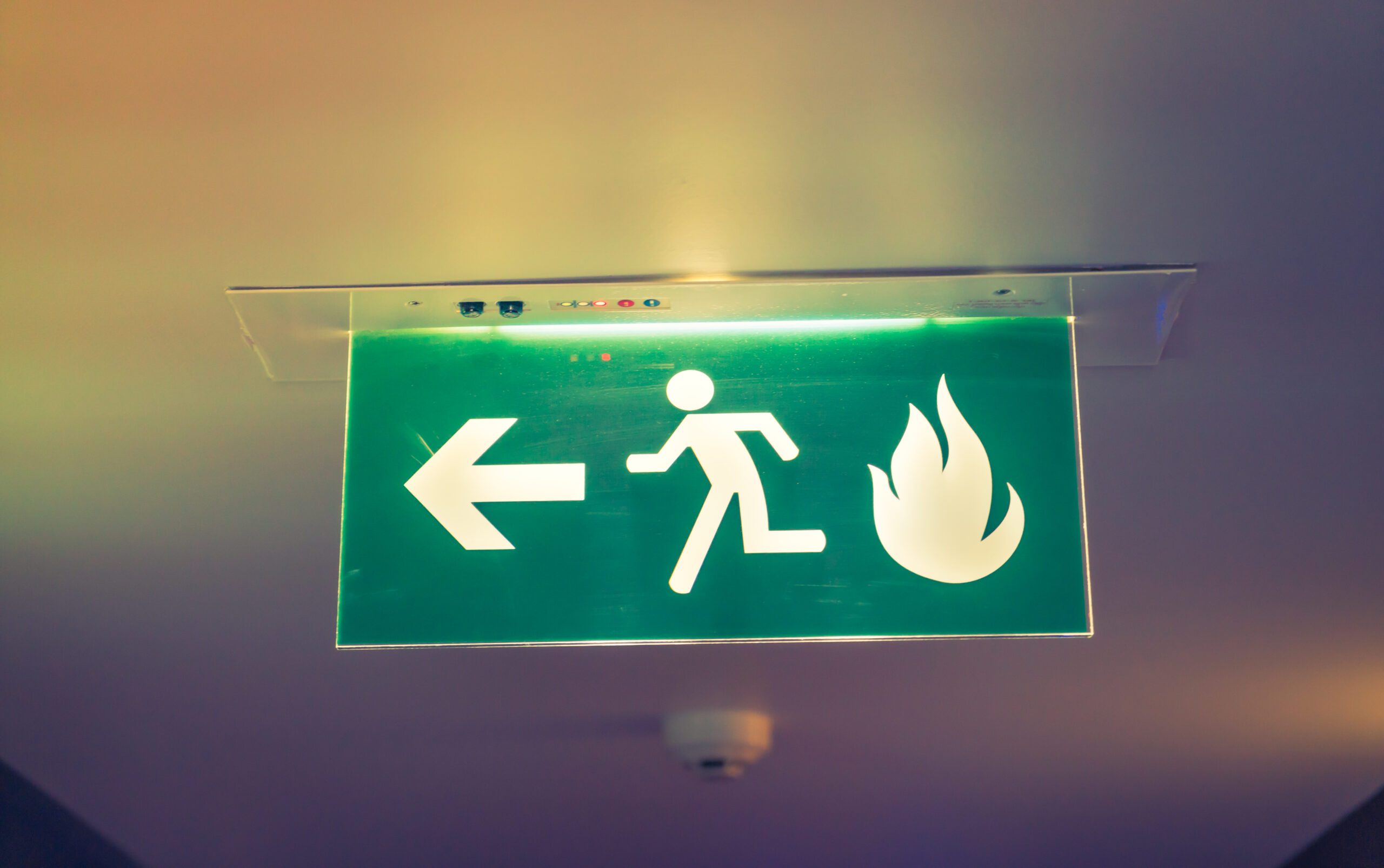 Fire exit ( Filtered image processed vintage effect. ) . https://fr.freepik.com/photos-gratuite/fire-exit-image-filtree-traitee-effet-vintage_1018678.htm#fromView=search&page=1&position=25&uuid=f39e59a9-024c-4ef4-a093-9f095ddd51a4